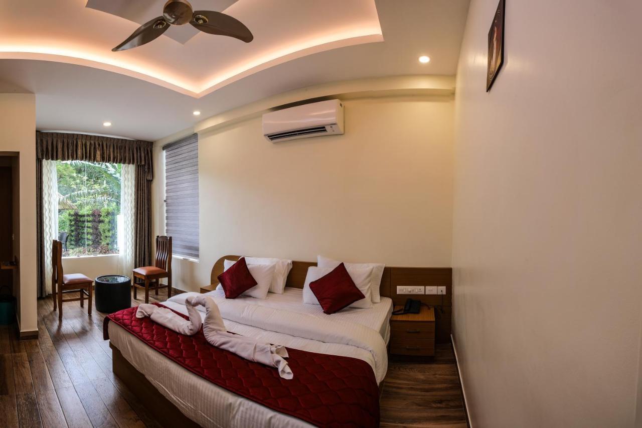 Thenmala Hormuz Inn Kolattupuzha Exterior photo